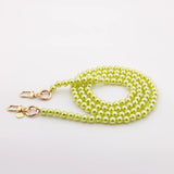 Mobile phone case with pearl necklace "SOLO" in SUNNY LIME