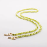 Mobile phone case with pearl necklace "SOLO" in SUNNY LIME