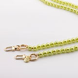 Mobile phone case with pearl necklace "SOLO" in SUNNY LIME